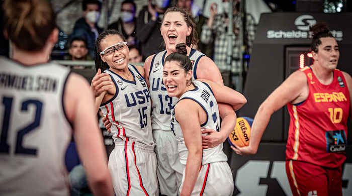 Allisha Gray, Stefanie Dolson and Kelsey Plum embrace